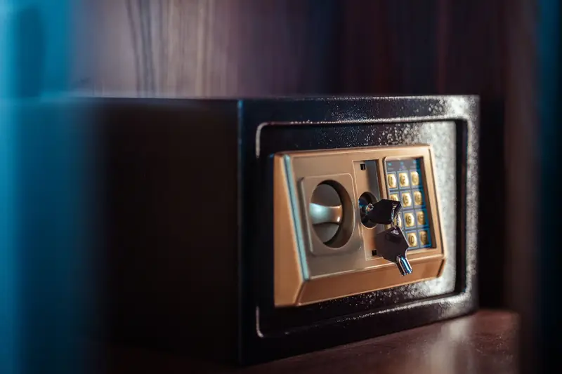 An electronic home safe with keypad and key